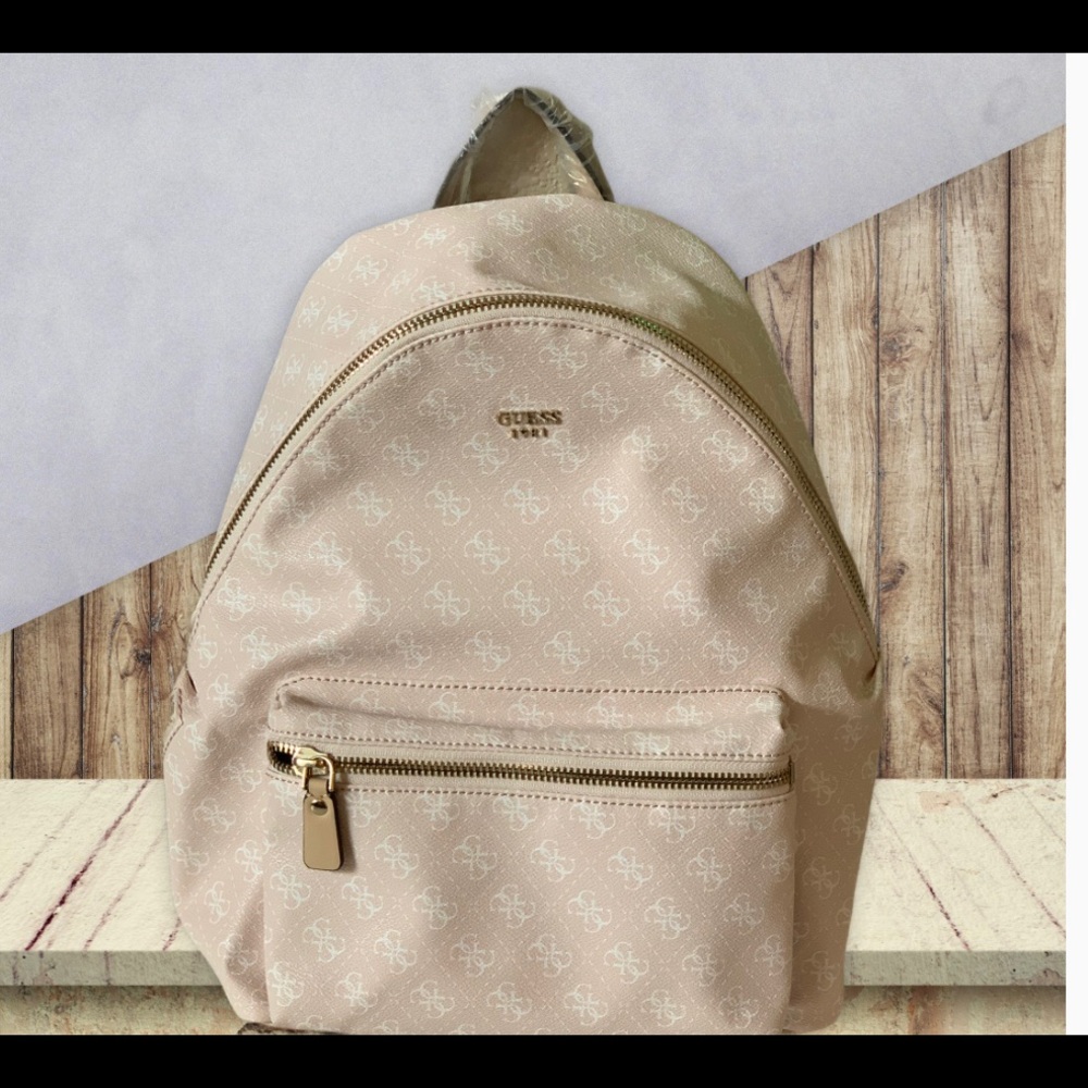 SOLD on Mercari <<—Guess Leeza Backpack - Rosa